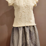 Zero Waste Skirt Gathered Abstract on mannequin in blue and grey with abstract wave pattern lined with organic cotton lining with The Jade Top in cream with shredded cotton finished over the op and un tucked