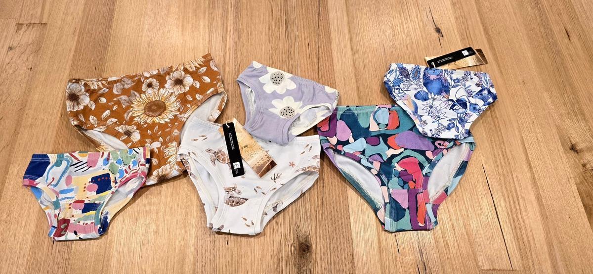 Australian-made children's underwear by Audrey & Grace - printed briefs styled on sand - ethical kids underwear