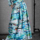 Close up of model in full-length Ocean Skirt with Preston Zly winter boots and knit jumper