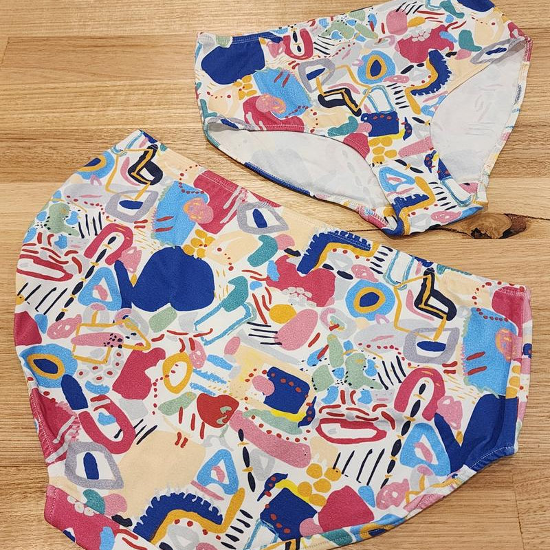 Big Girls Briefs in the Magnetic print, Australian made cotton underwear 2 pairs, one back view and the other smaller pair, front view