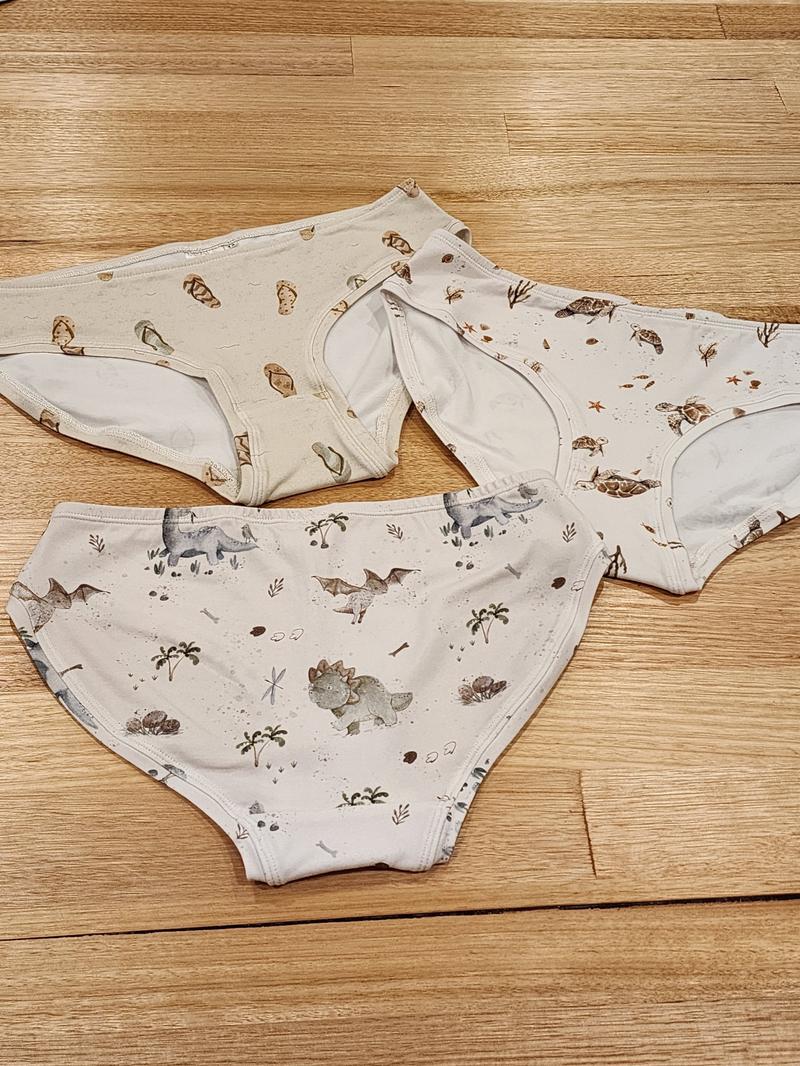 Big Girls Briefs in the Thongs print, Australian made cotton underwear shown with two other pairs in other prints