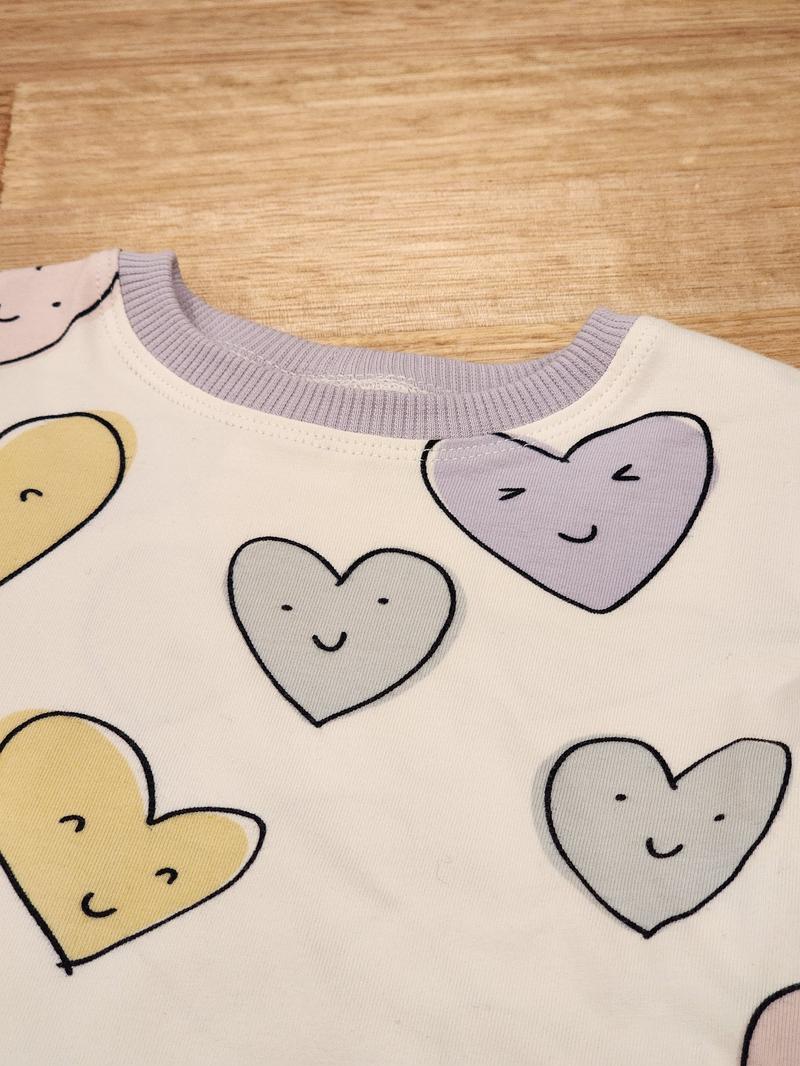 Kids puff sleeve tee in Smiley Hearts print, organic cotton Close Up