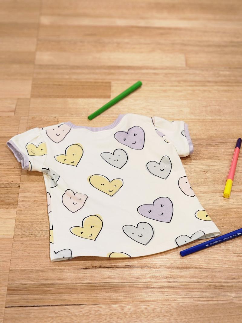Kids puff sleeve tee in Smiley Hearts print, organic cotton front 2