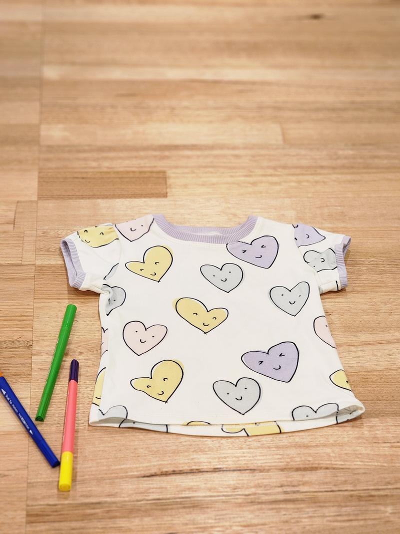Kids puff sleeve tee in Smiley Hearts print, organic cotton front