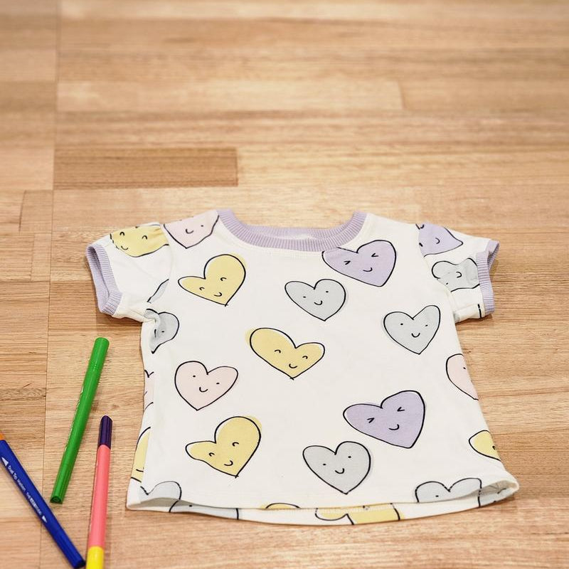 Kids puff sleeve tee in Smiley Hearts print, organic cotton front