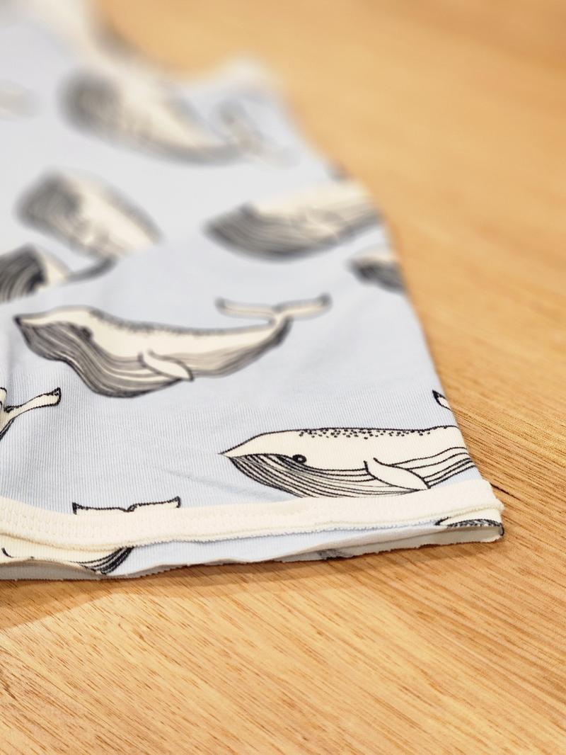 Kids raw edge tee in Blue Whales print, organic cotton close up of sleeve detail