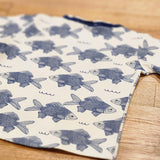 Kids raw edge tee in Fish print, organic cotton — back flat lay