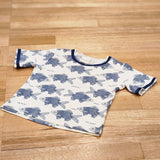 Kids raw edge tee in Fish print, organic cotton — front flat lay
