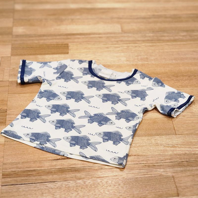 Kids raw edge tee in Fish print, organic cotton — front flat lay