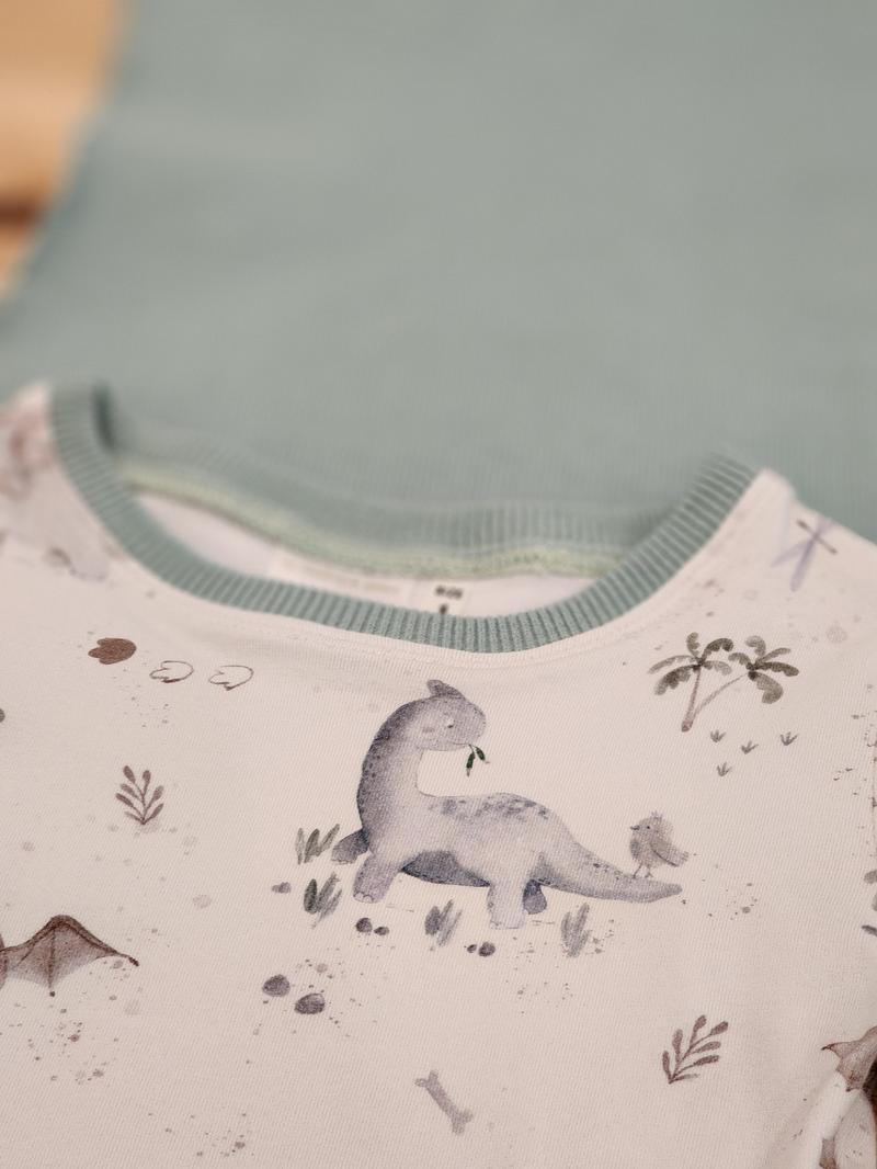 Kids tee in Baby Dinos print, Australian cotton close up of neck