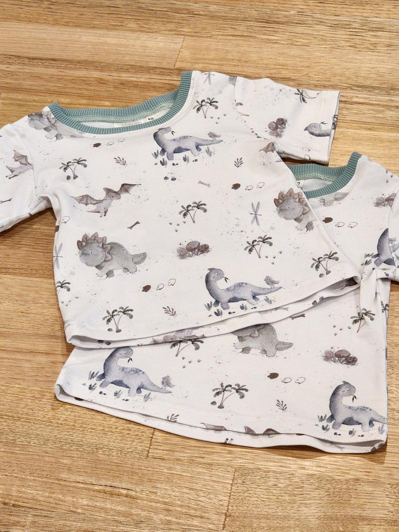 Two Kids tee in Baby Dinos print, Australian cotton one on top of the other