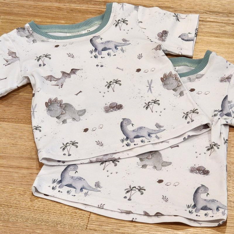 Two Kids tee in Baby Dinos print, Australian cotton one on top of the other