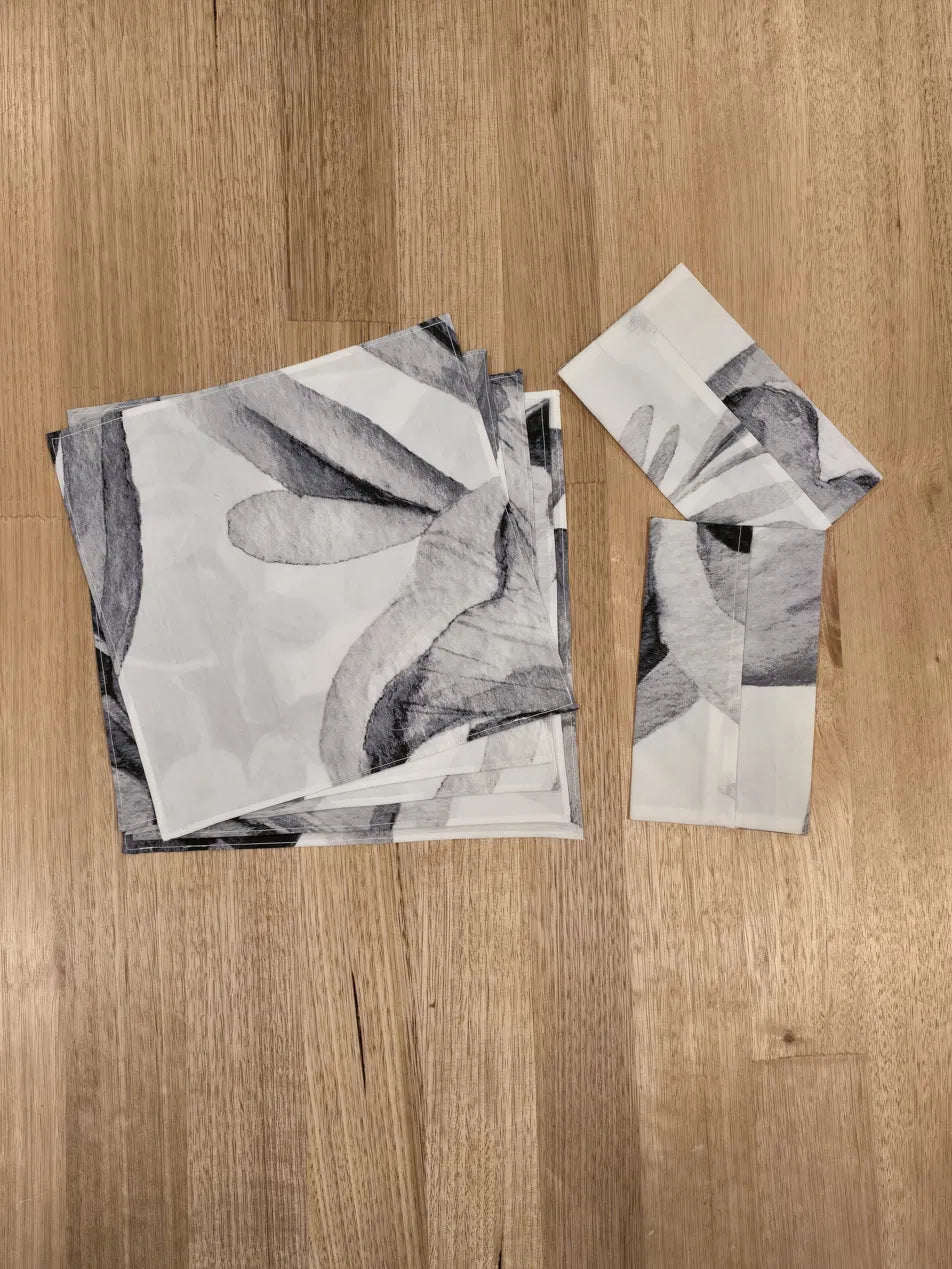 The Floriferous Ladies Handkerchiefs stacked alongside matching pouches from  by Audrey and Grace, limited edition OEKO-TEX certified cotton, handmade in Melbourne's Dandenong Ranges.
