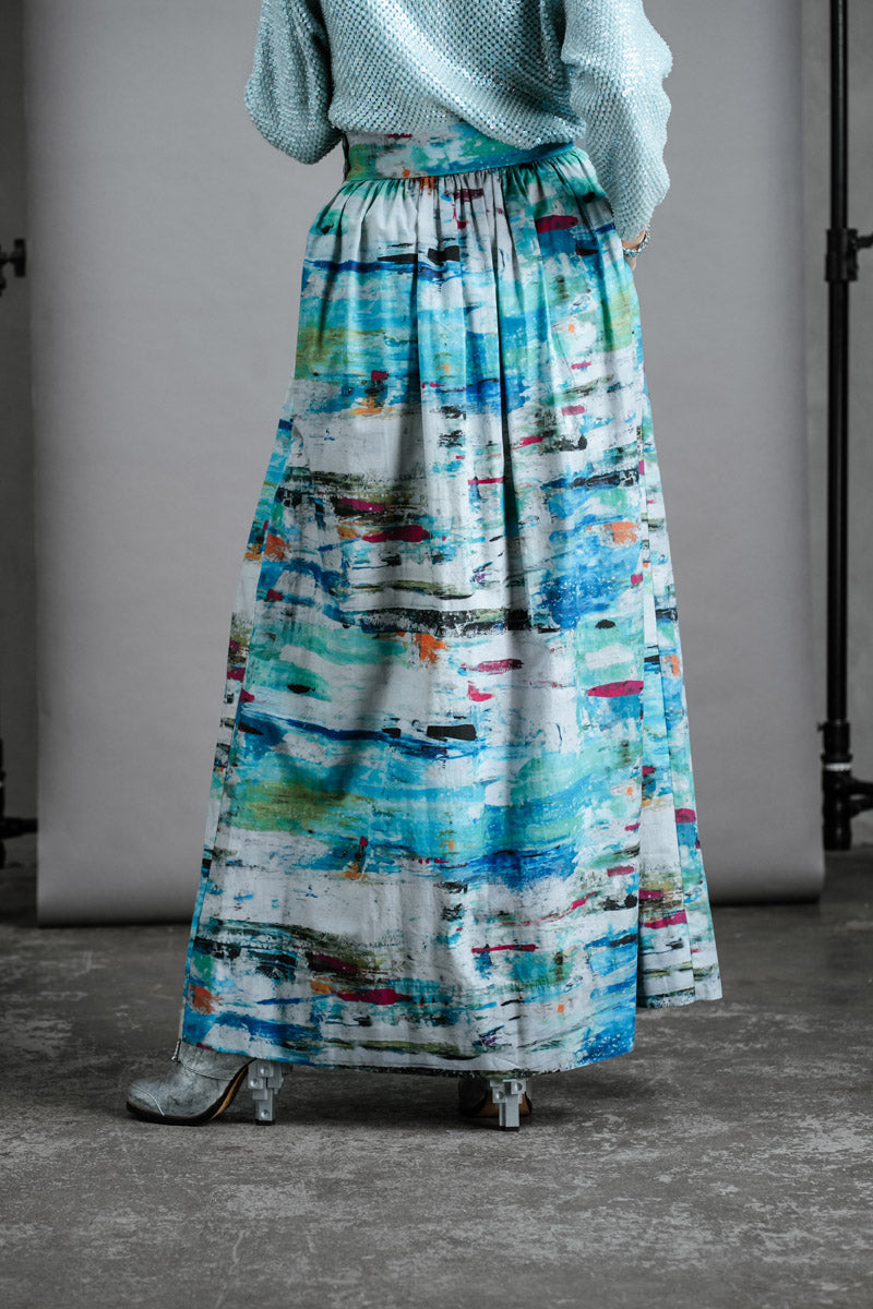 Close up back view of the by Audrey and Grace Zero Waste Ocean Skirt styled with vintage sequinned cardigan.