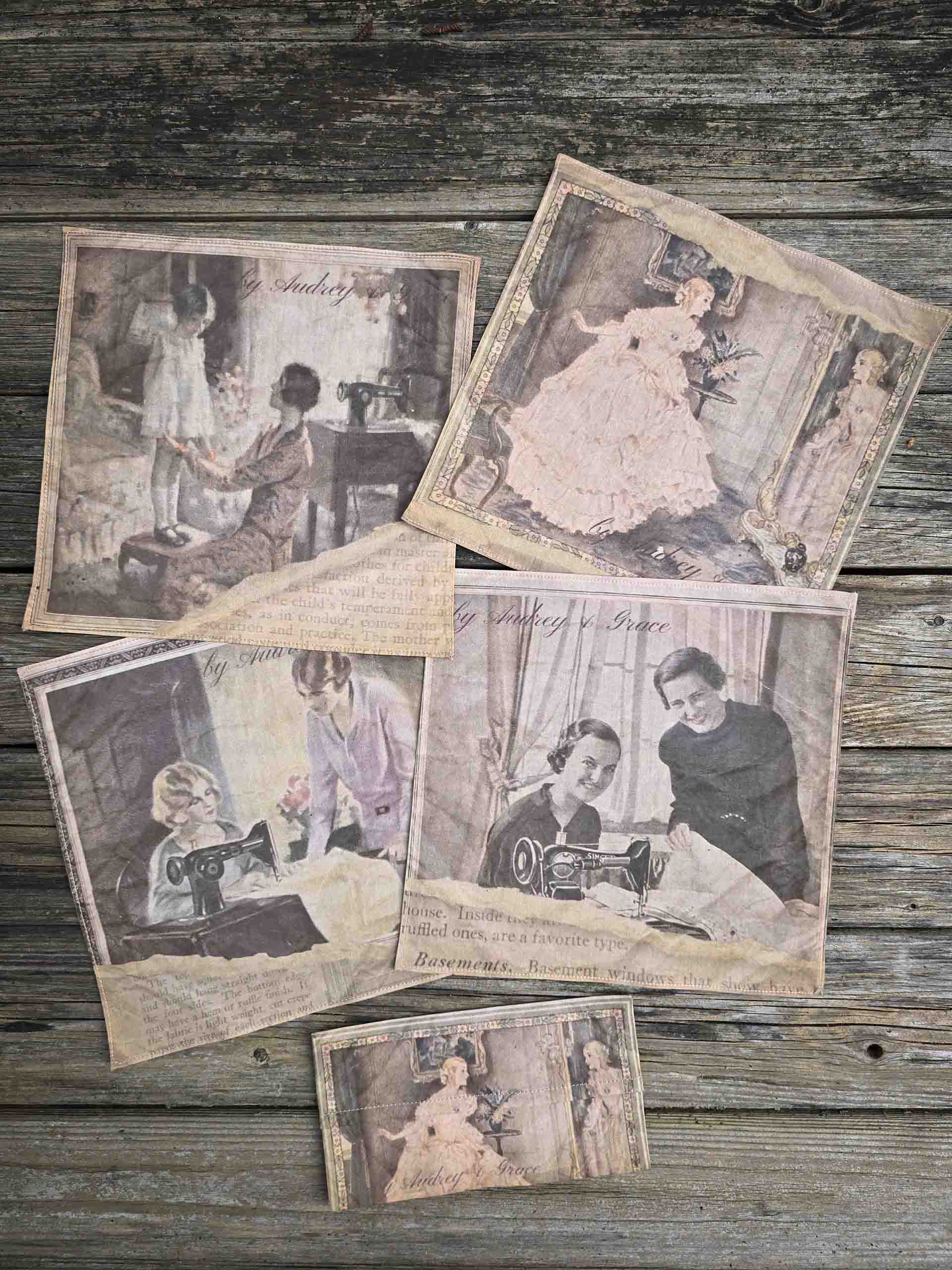 A set of 4 by Audrey and Grace Ladies Handkerchiefs laid out, showing each image. 1 is Mother and child, 2 is The Crinoline Lady, 3 is The lesson with two ladies at the sewing machine and 4 is  Good Taste, showing another two smiling ladies at a sewing machine. All images from the 1920s, with a tear through the image and old type face showing through underneath. They are accompanied b a small rectangular pouch featuring the Crinoline Lady image sitting below them.
