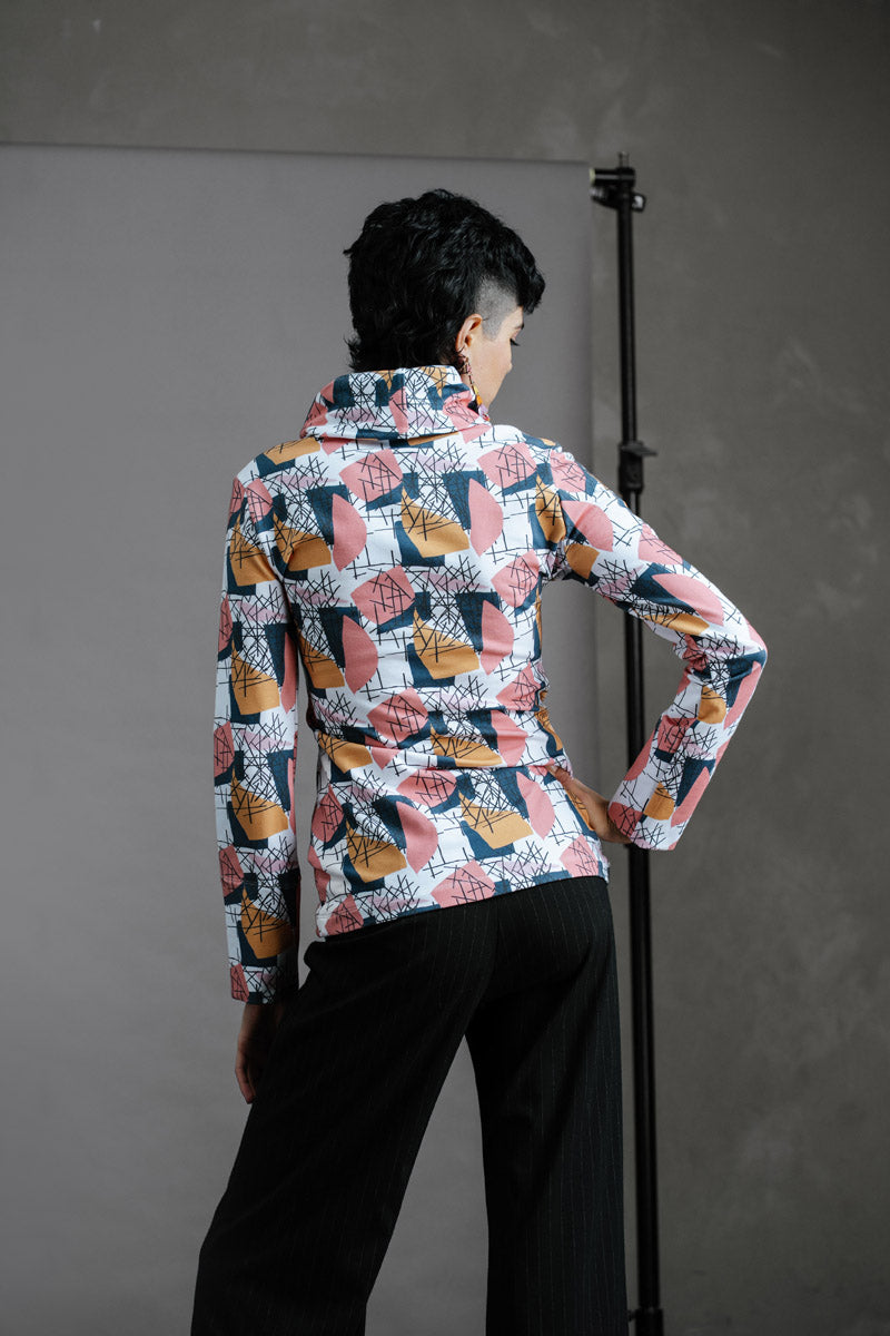 The Ruby Jumper Jumble Print, with large cowl neck, Australian Women's Jumpers made from Australian cotton — Back facing with hand on hip