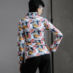 The Ruby Jumper Jumble Print, with large cowl neck, Australian Women's Jumpers made from Australian cotton — Back facing with hand on hip