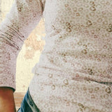 The Ruby Jumper Leopard Print, with large cowl neck, Australian Women's Jumpers made from Australian cotton — Front close up with denim skirt